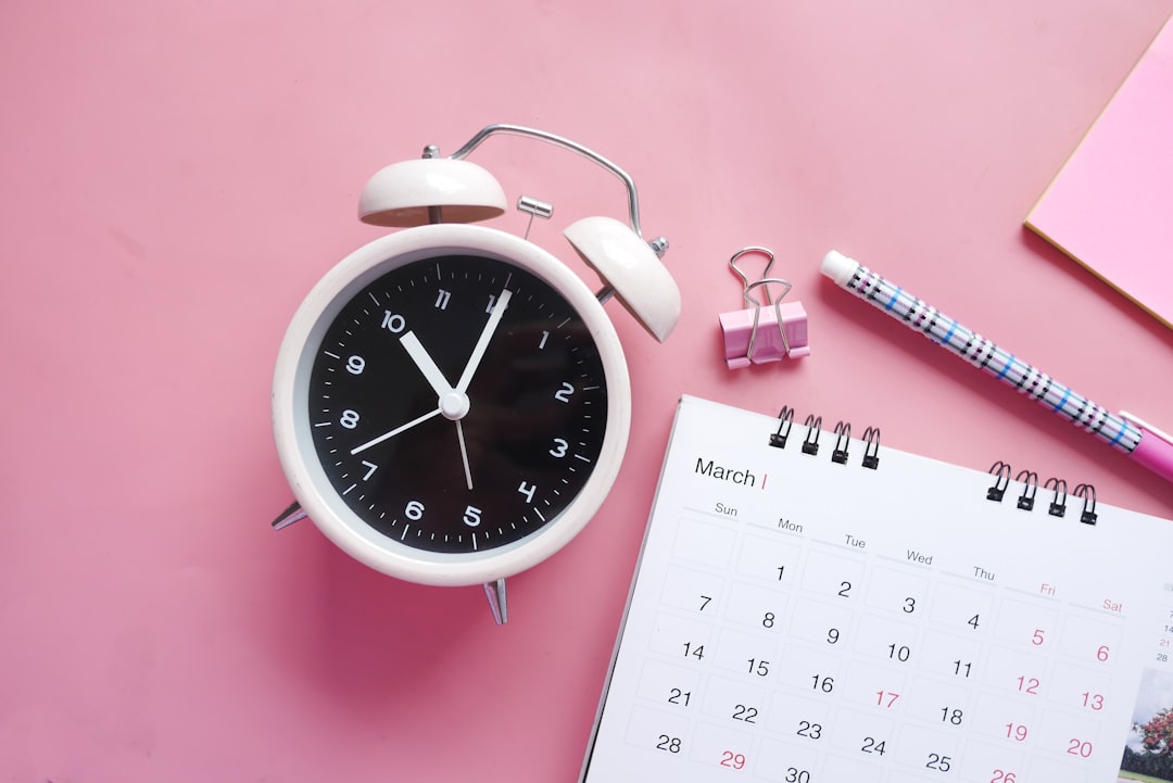 Calendar and alarm clock — representing the accreditation visit countdown and preparation timeline