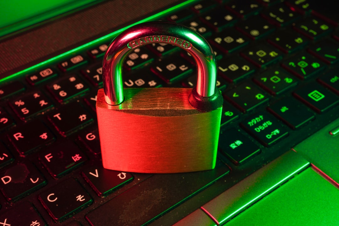 Red padlock on a computer keyboard — representing cybersecurity and data protection for accreditation tools