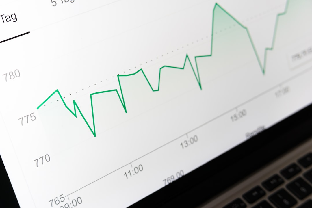 Stock market chart displayed on laptop — representing the return on investment analysis for accreditation software