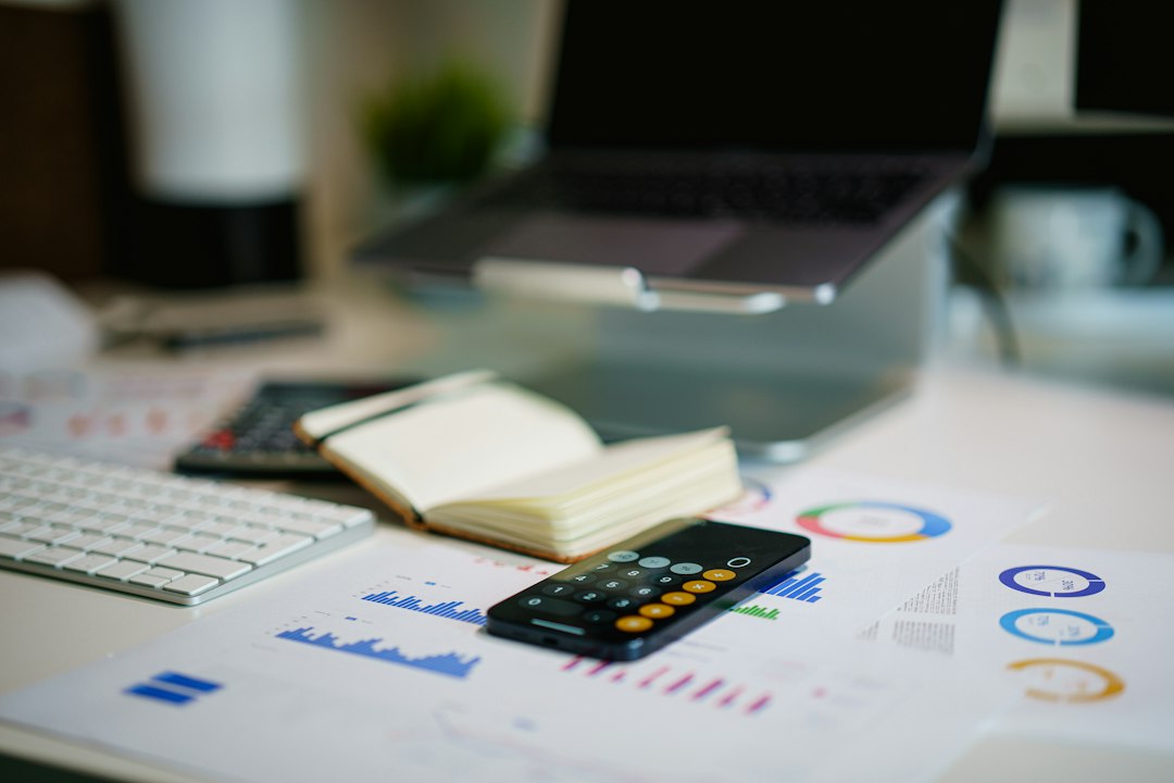 Assessment data and improvement charts on a desk, the raw material behind a continuous-improvement section