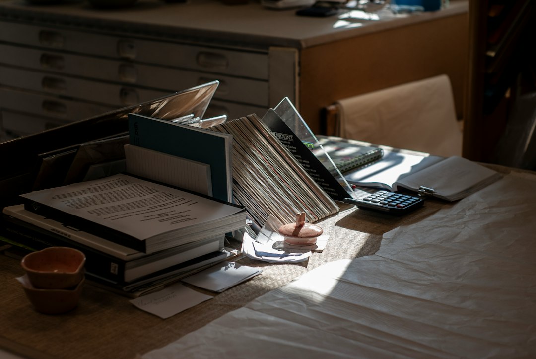 An organized desk with filed supporting documents and an in-tray, the appendices section of a self-study report